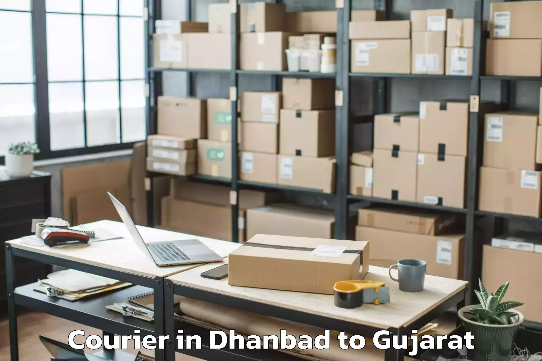 Top Dhanbad to Rajkot Airport Raj Courier Available